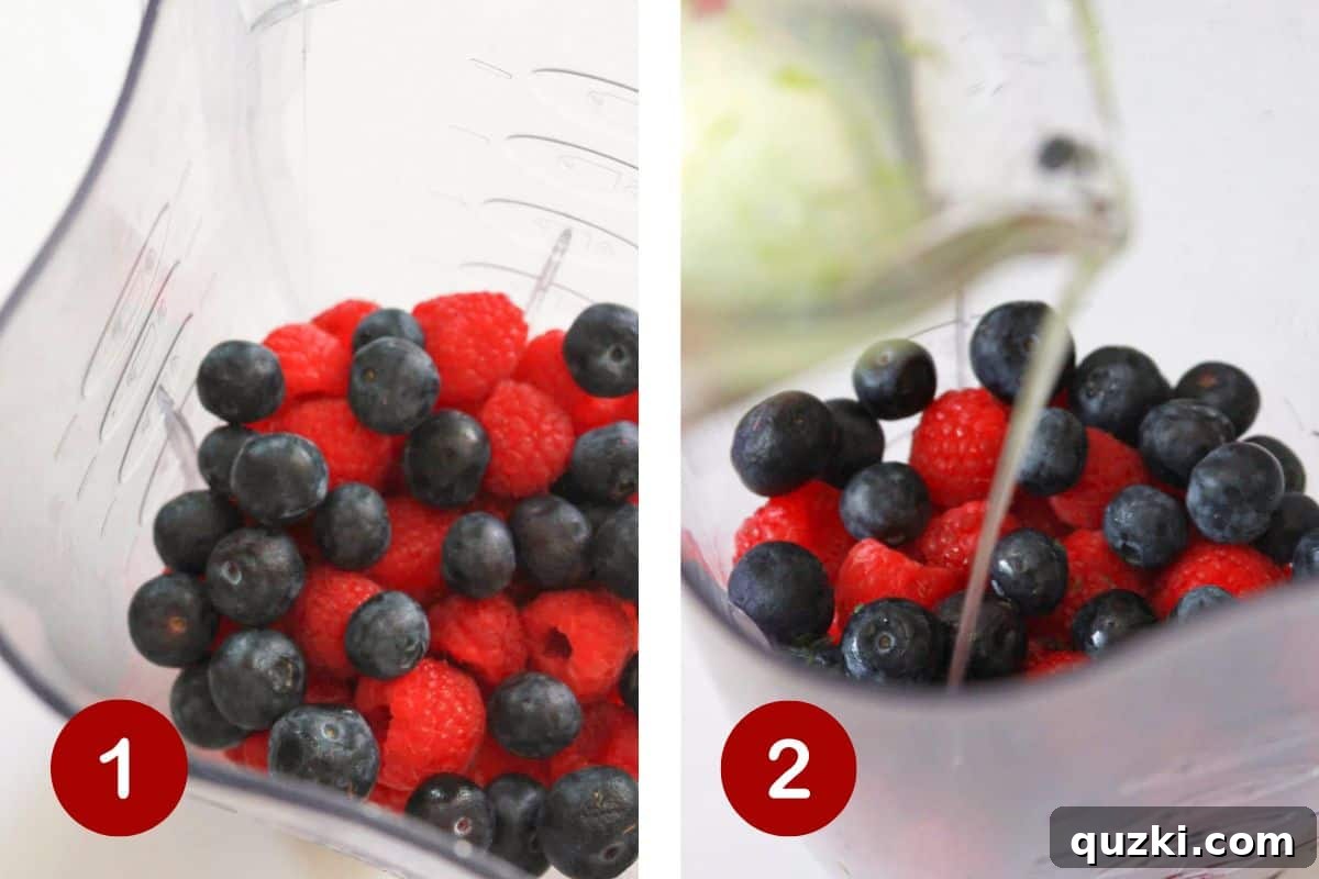 Vibrant Frozen Fruit Daiquiri 3 Fresh strawberries, raspberries, blueberries, and lime simple syrup being added to a blender for a frozen daiquiri.