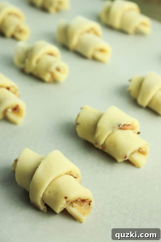 The honey pecan filling generously spread over a rolled-out disc of cookie dough, extending close to the edges.