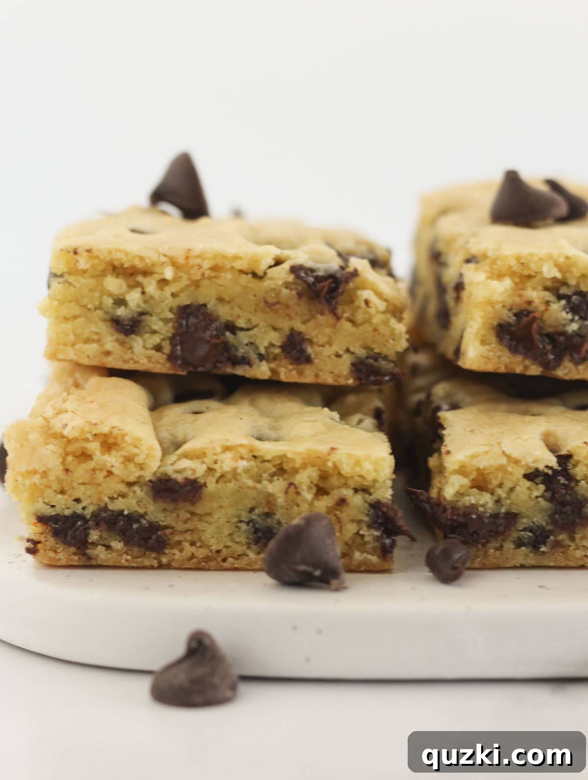 Easy chocolate chip cookie bars with a yellow cake mix, perfectly golden and inviting.