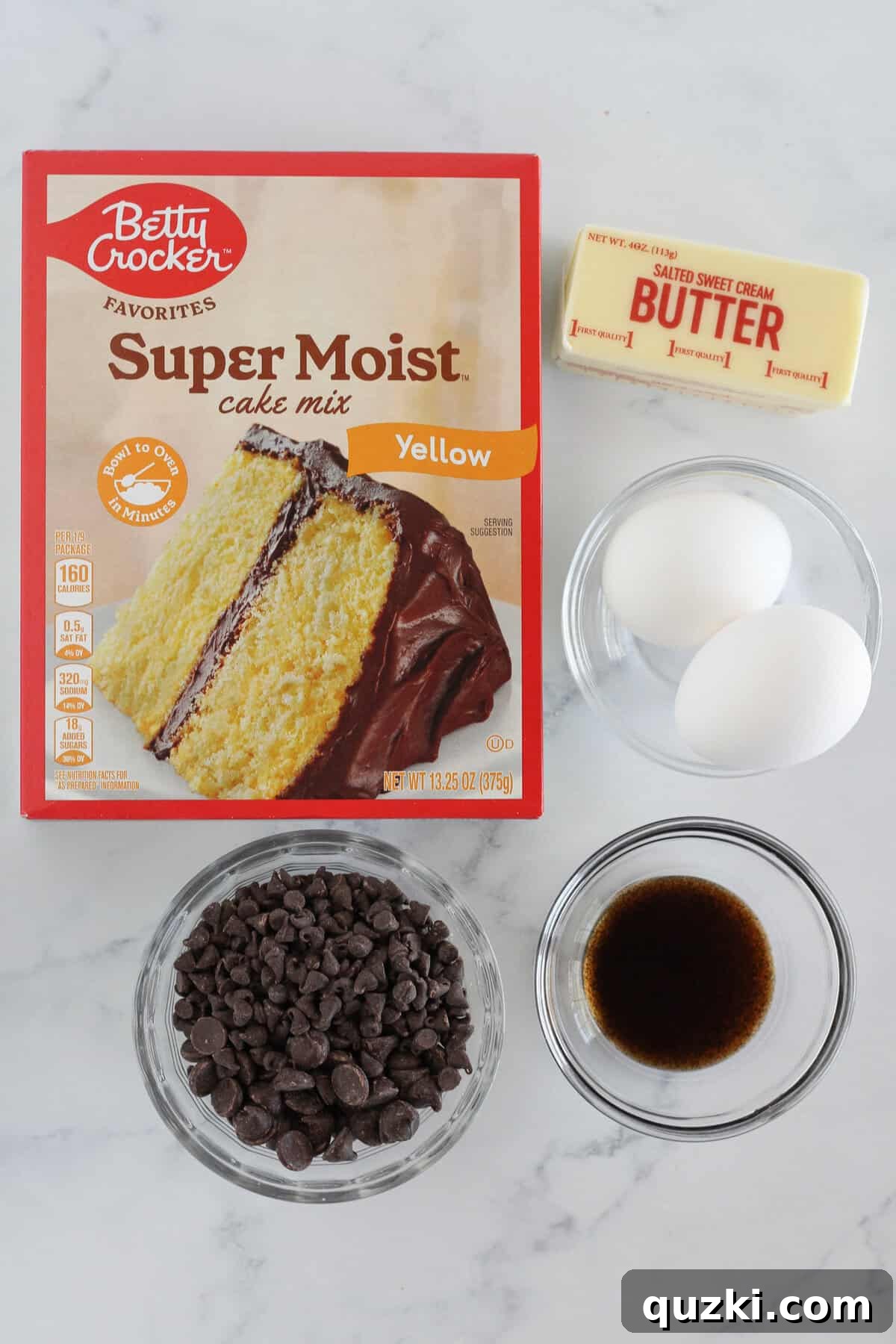 A selection of the key ingredients required to make delicious chocolate chip cookie bars using a cake mix.