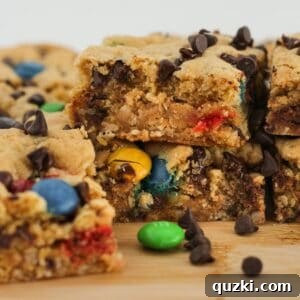 Close-up of Monster Cookie Oatmeal Bars, showing M&M's and chocolate chips.