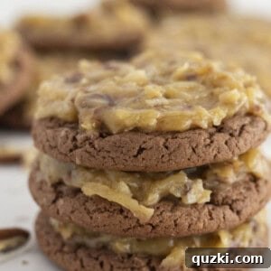 Pratik Alman Çikolatalı Kek Karışımı Kurabiyeleri 8 German chocolate cake mix cookies stacked on each other.