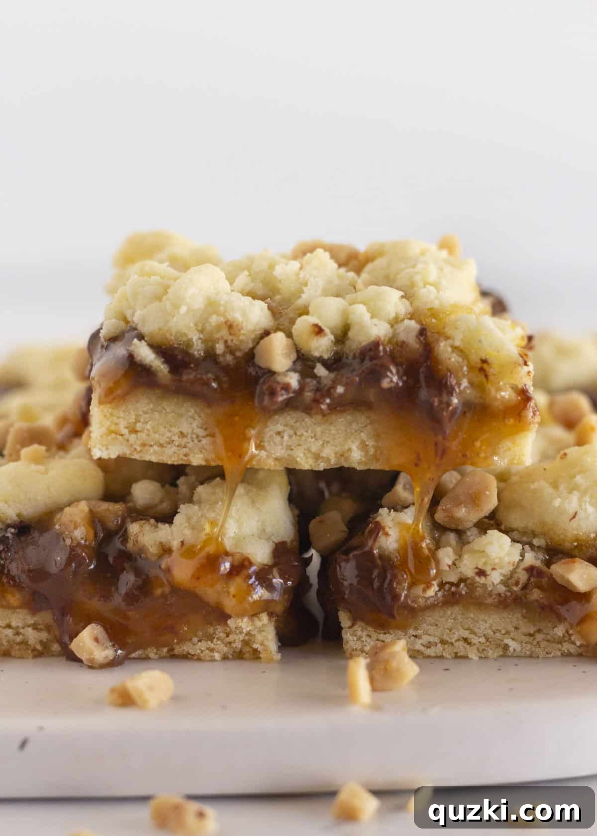 Buttery Toffee Chocolate Chip Bars 2 Stacked Easy Toffee Cookie Bars showcasing their gooey caramel and melted chocolate chips