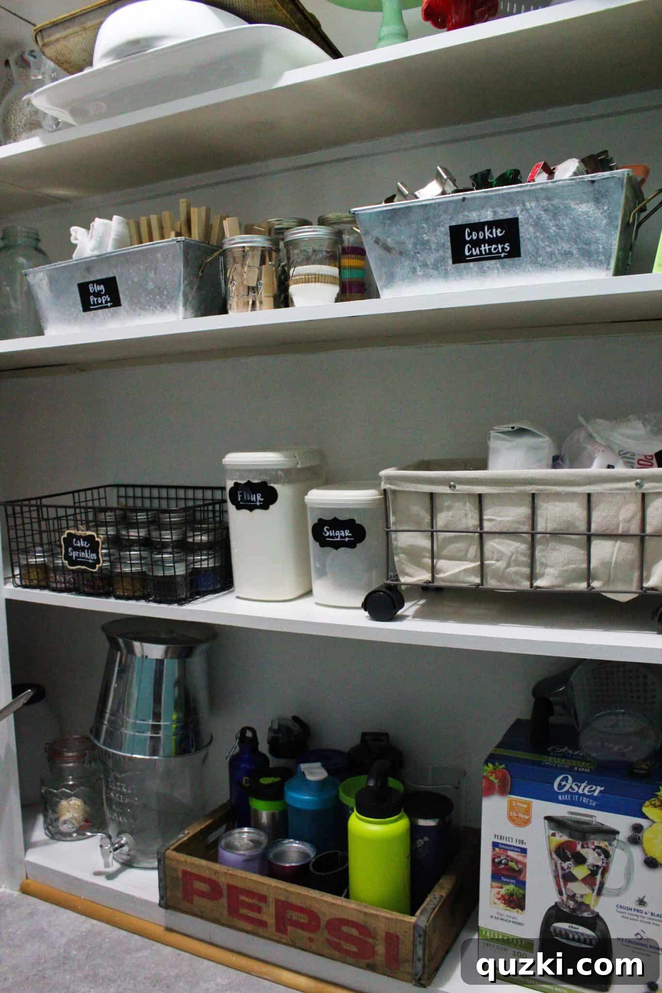Pantry Organization Game-Changers 6 Pantry shelf showing extra kitchen appliances and baking supplies organized neatly, demonstrating effective use of space.