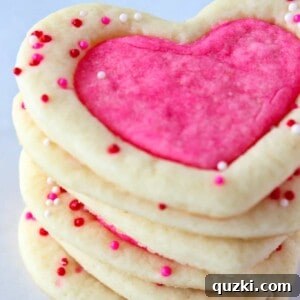 Easy Valentine's Day Sugar Cookies with a pink and white heart design