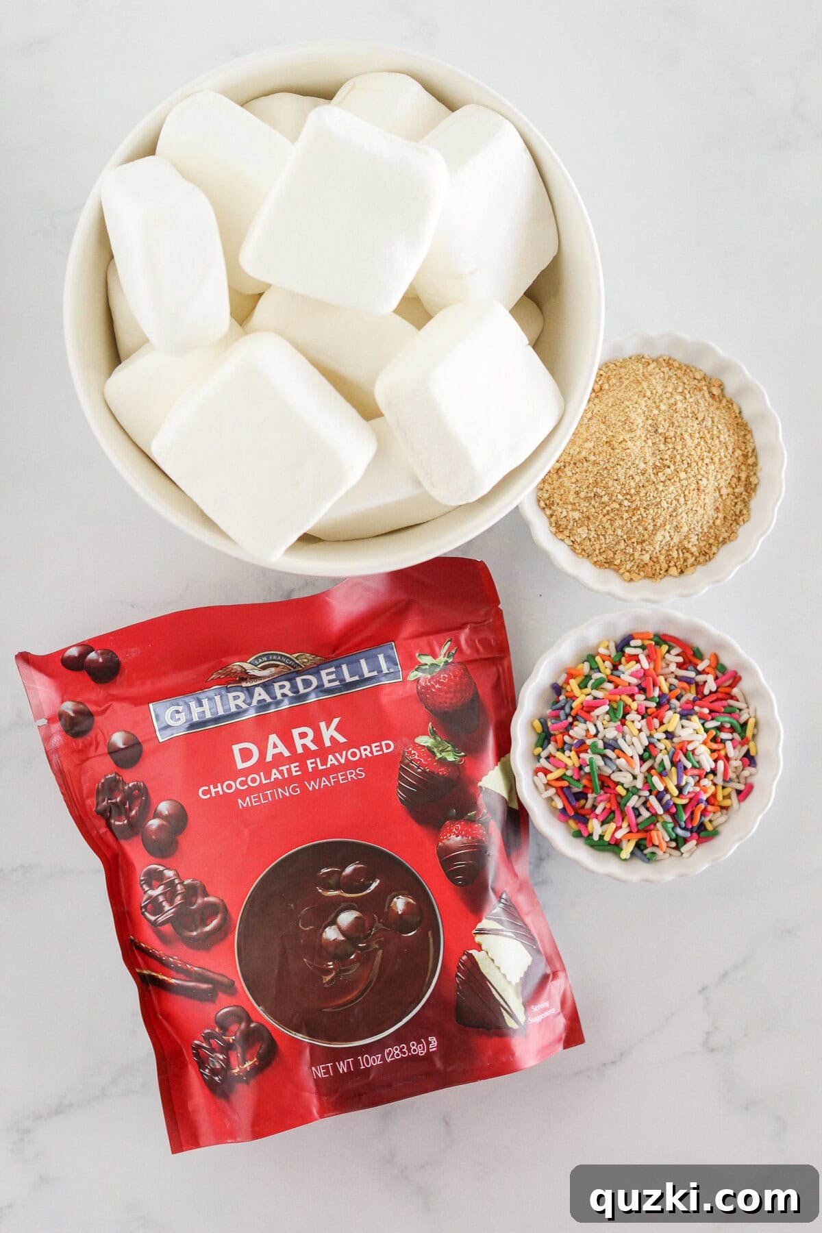 Easy Two-Ingredient Chocolate Dipped Marshmallows 3 The two simple ingredients required to make delicious chocolate covered marshmallows: marshmallows and chocolate melting wafers.