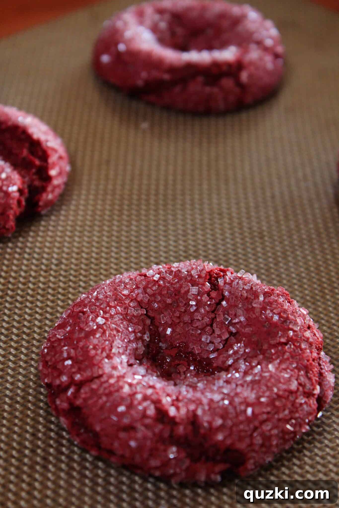 Indulgent Valentines Red Velvet Cheesecake Cookies Cake Mix Magic 8 Close-up of a partially baked red velvet cookie, perfectly indented for the cheesecake filling