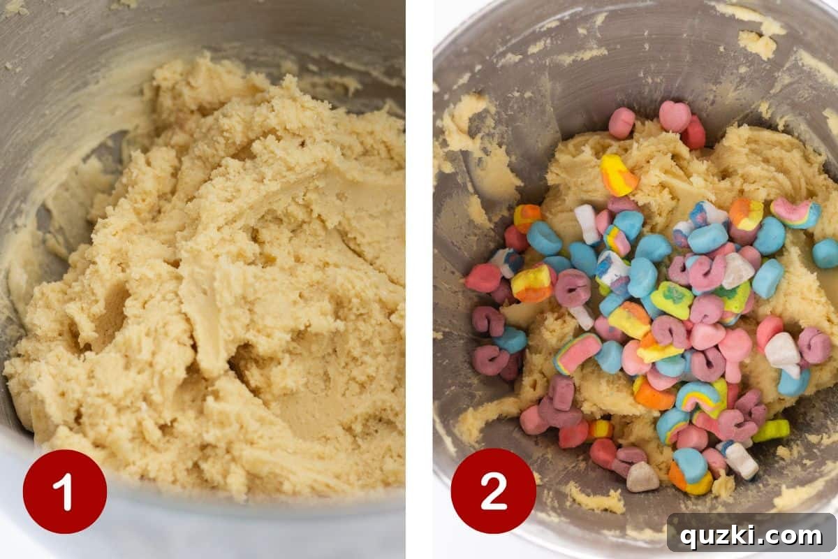 Lucky Charms cookie dough with marshmallows mixed in, ready for scooping and baking.
