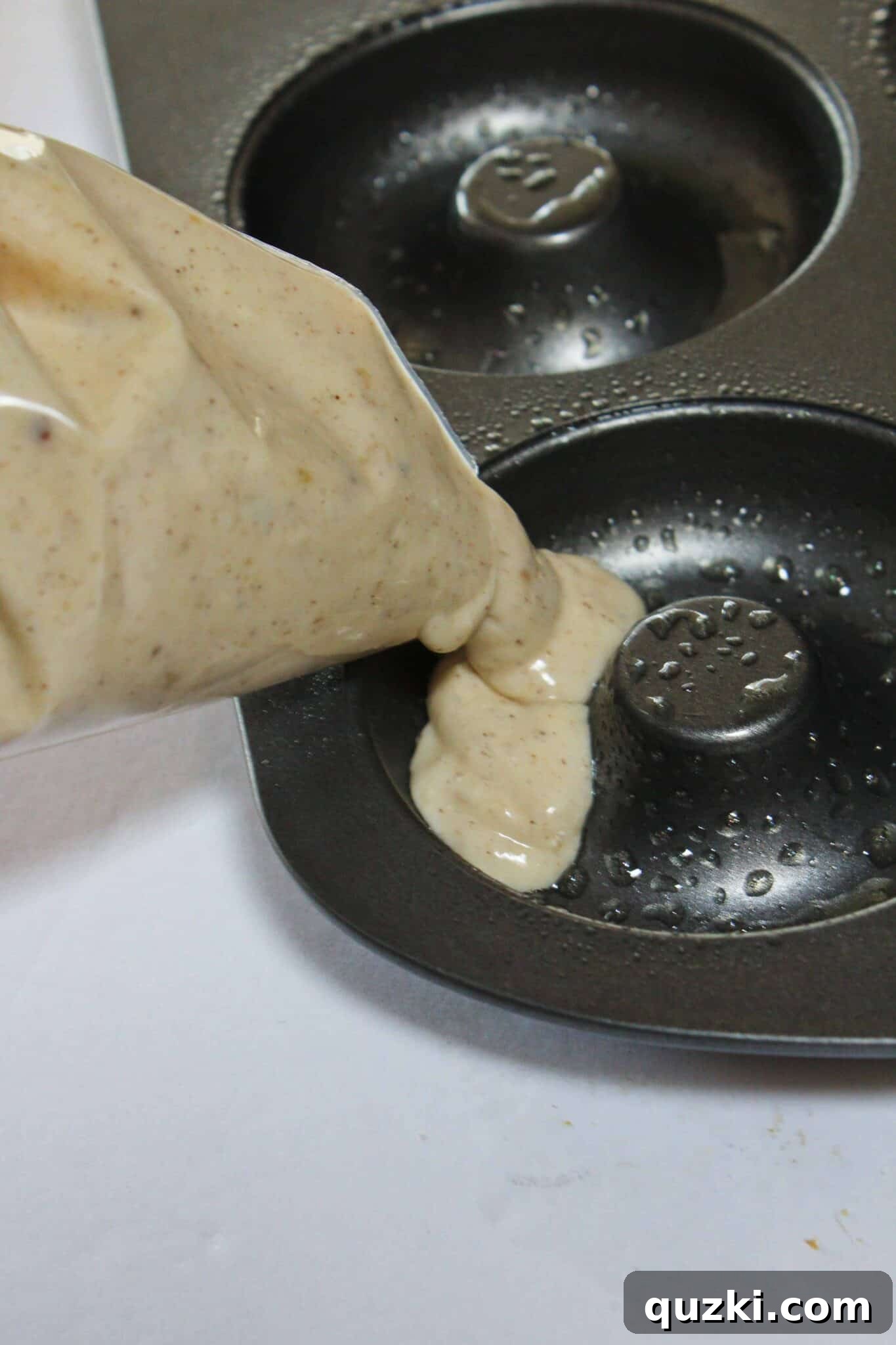 Easy Cinnamon Crumb Donut Recipe Made with a Pancake Mix featured by top US dessert blog, Practically Homemade