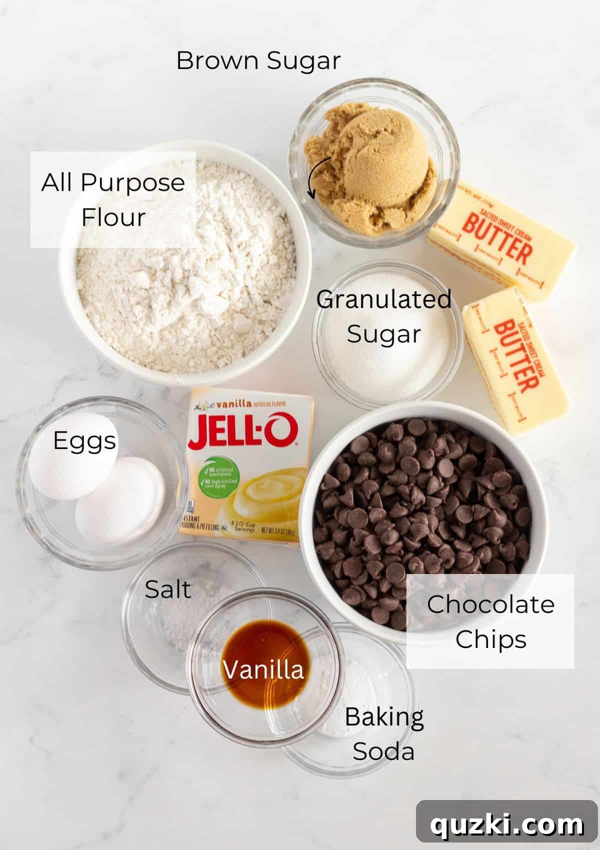 A flat lay photograph showing all the essential ingredients laid out neatly for making Grandma Pearl's Super Soft Chocolate Chip Cookies.