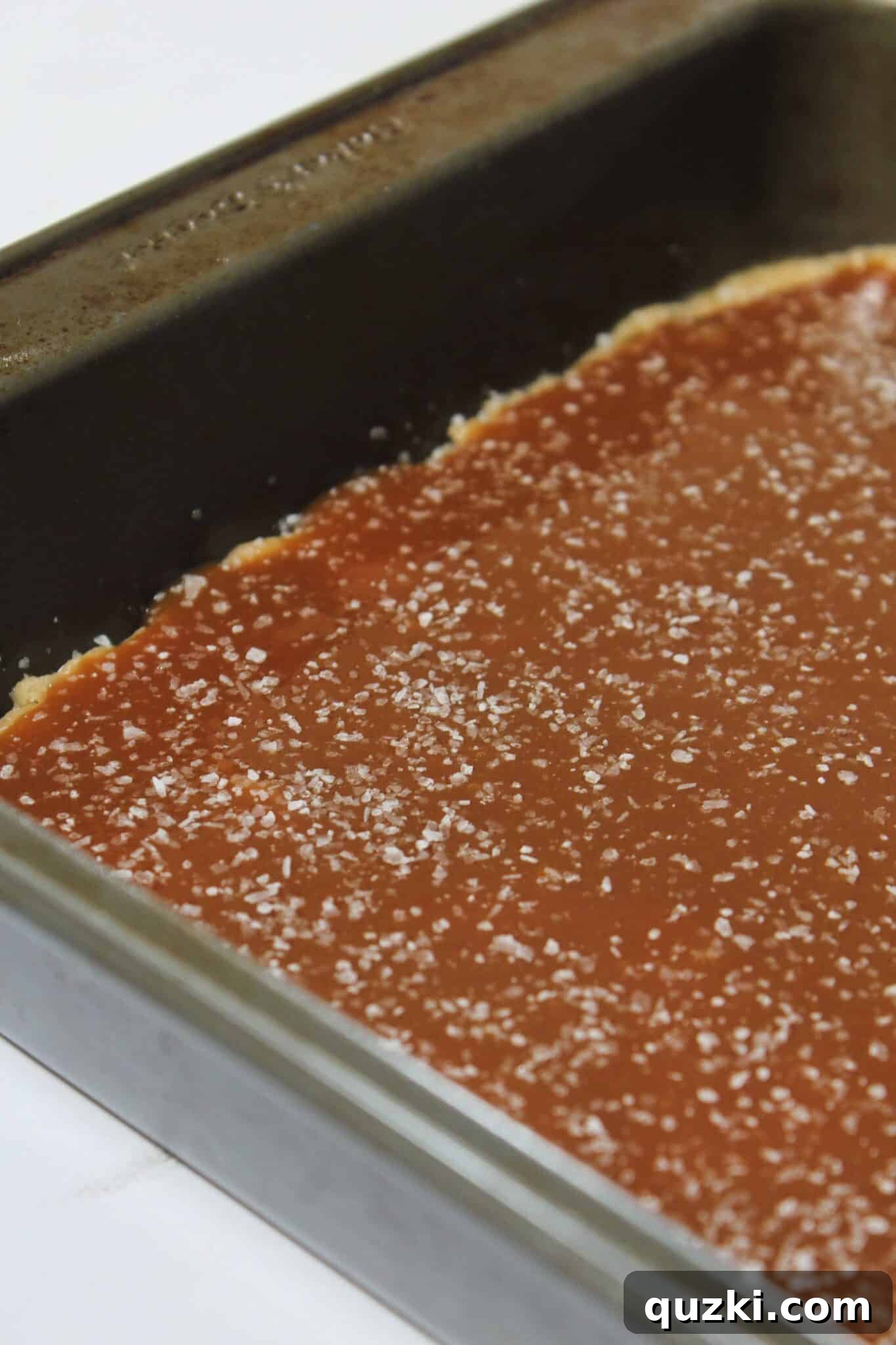 Salted Caramel Chocolate Chip Cookie Bars 10 Sprinkling kosher salt generously over the caramel layer to create salted caramel cookie bars.