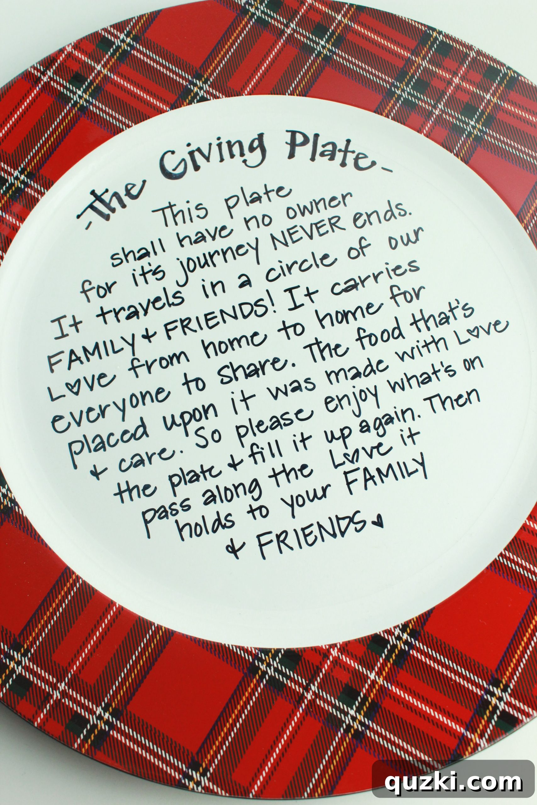 A beautifully decorated 'Giving Plate' filled with homemade cookies, ready to be shared, embodying the spirit of generosity and community during the holidays.