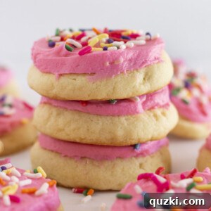 Homemade lofthouse sugar cookies stacked on each other, ready to be enjoyed.