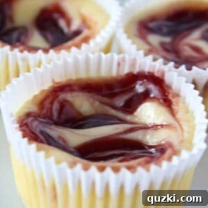 Dessert Cup Ideas: Mini Raspberry Cheesecakes featured by top US dessert blog, Practically Homemade.