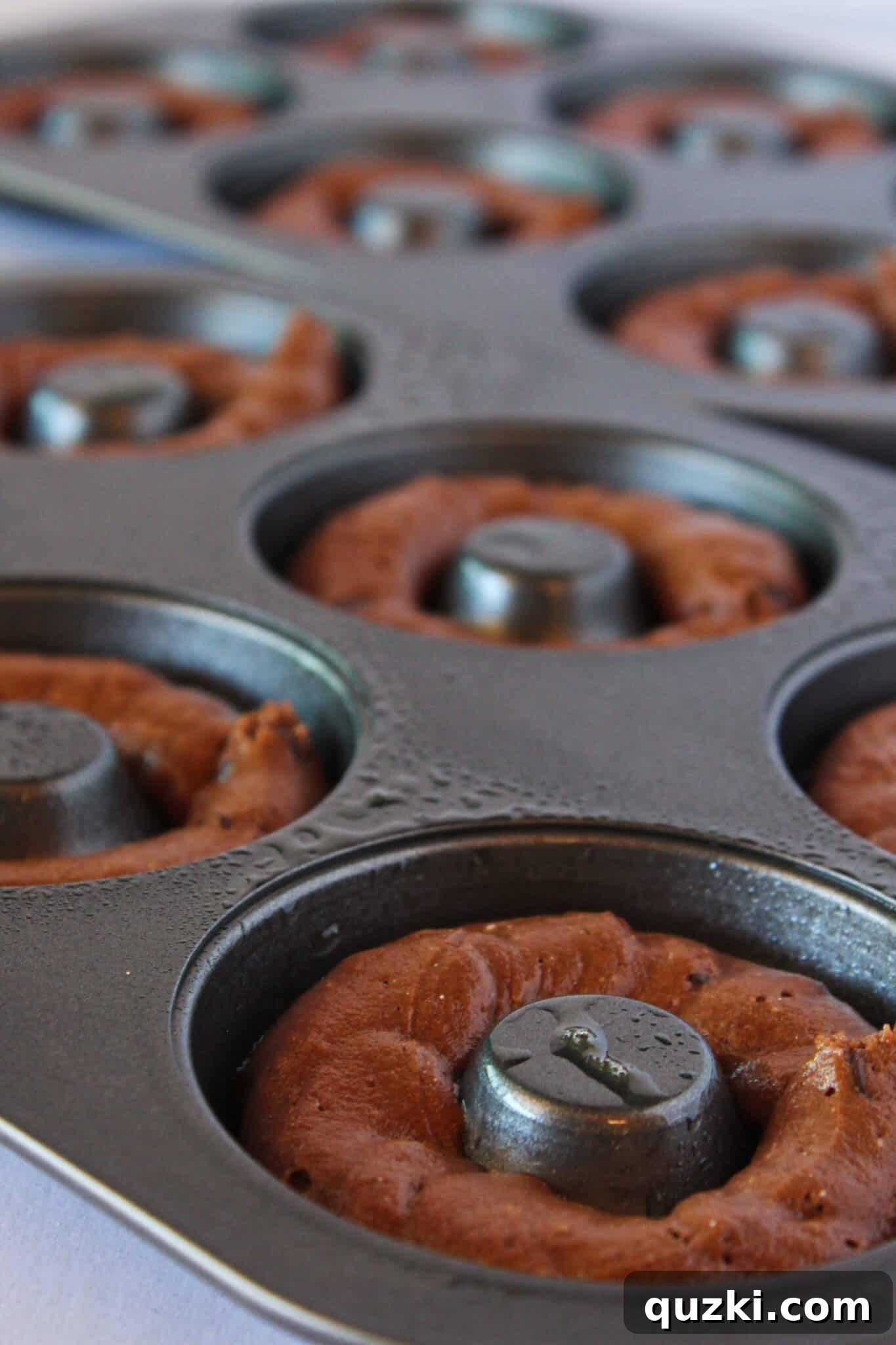 Easy Chocolate Donuts Recipe with Pancake Mix featured by top US dessert blog, Practically Homemade