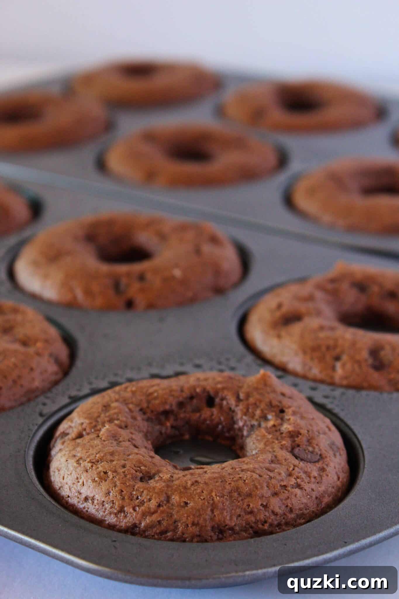 Easy Chocolate Donuts Recipe with Pancake Mix featured by top US dessert blog, Practically Homemade