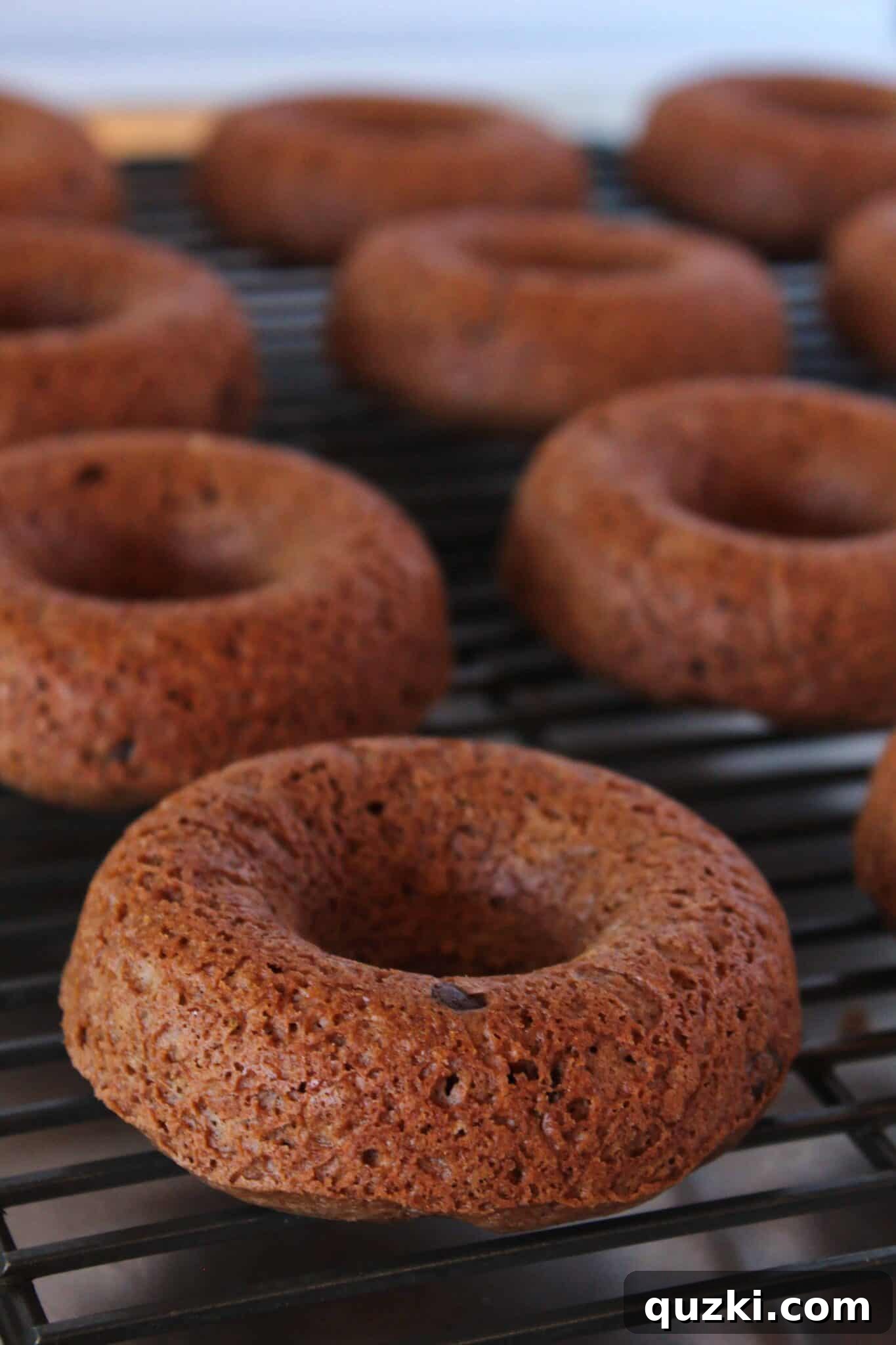 Easy Chocolate Donuts Recipe with Pancake Mix featured by top US dessert blog, Practically Homemade