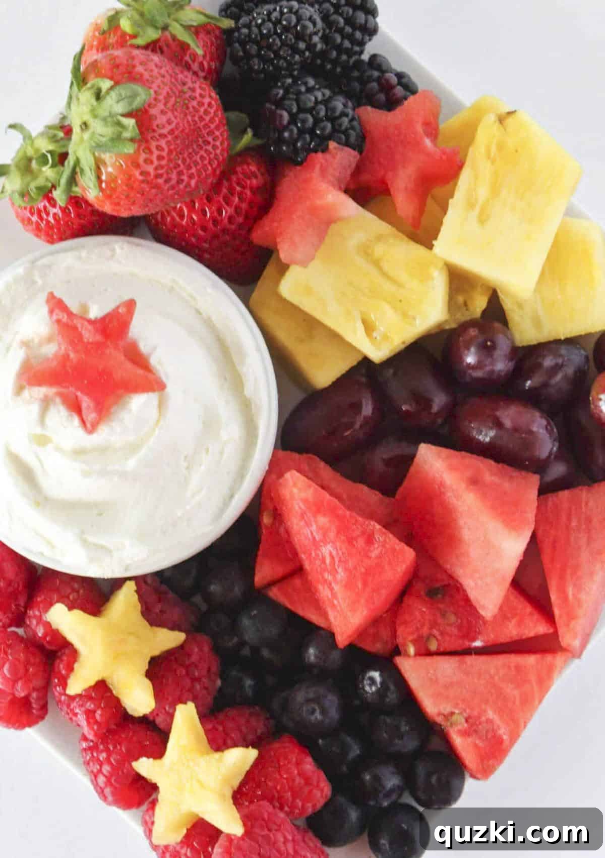 Looking down on a 4th of July fruit tray featuring an abundance of fresh, colorful fruit.
