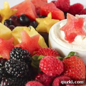 A 4th of July fruit platter with cheesecake dip, ready to serve.