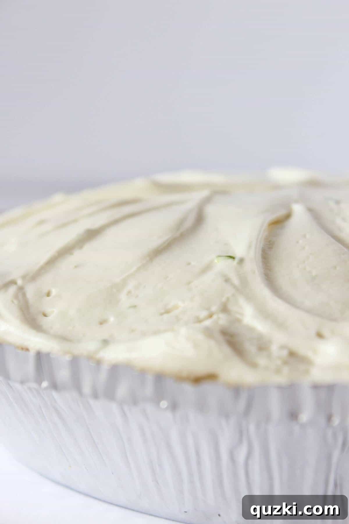 Effortless Margarita Cheesecake Dream 6 Finishing the filling and adding it to a pre-made crust.