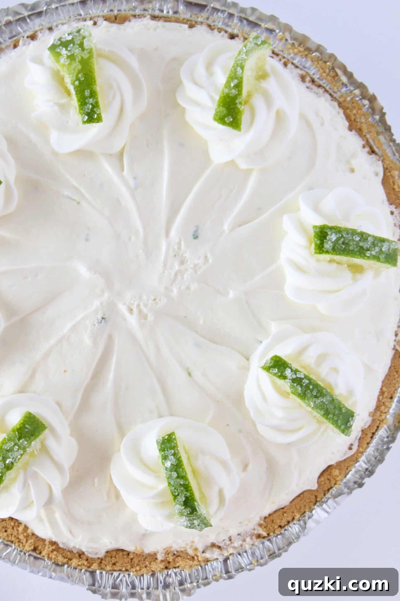 Effortless Margarita Cheesecake Dream 7 A finished margarita no bake cheesecake, garnished and ready to serve.