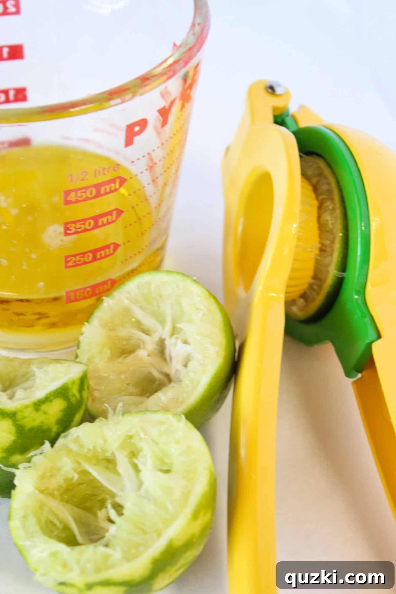 Simple Marinade for Succulent Chicken 3 Fresh limes being juiced for an easy chicken marinade, emphasizing the vibrant citrus element.