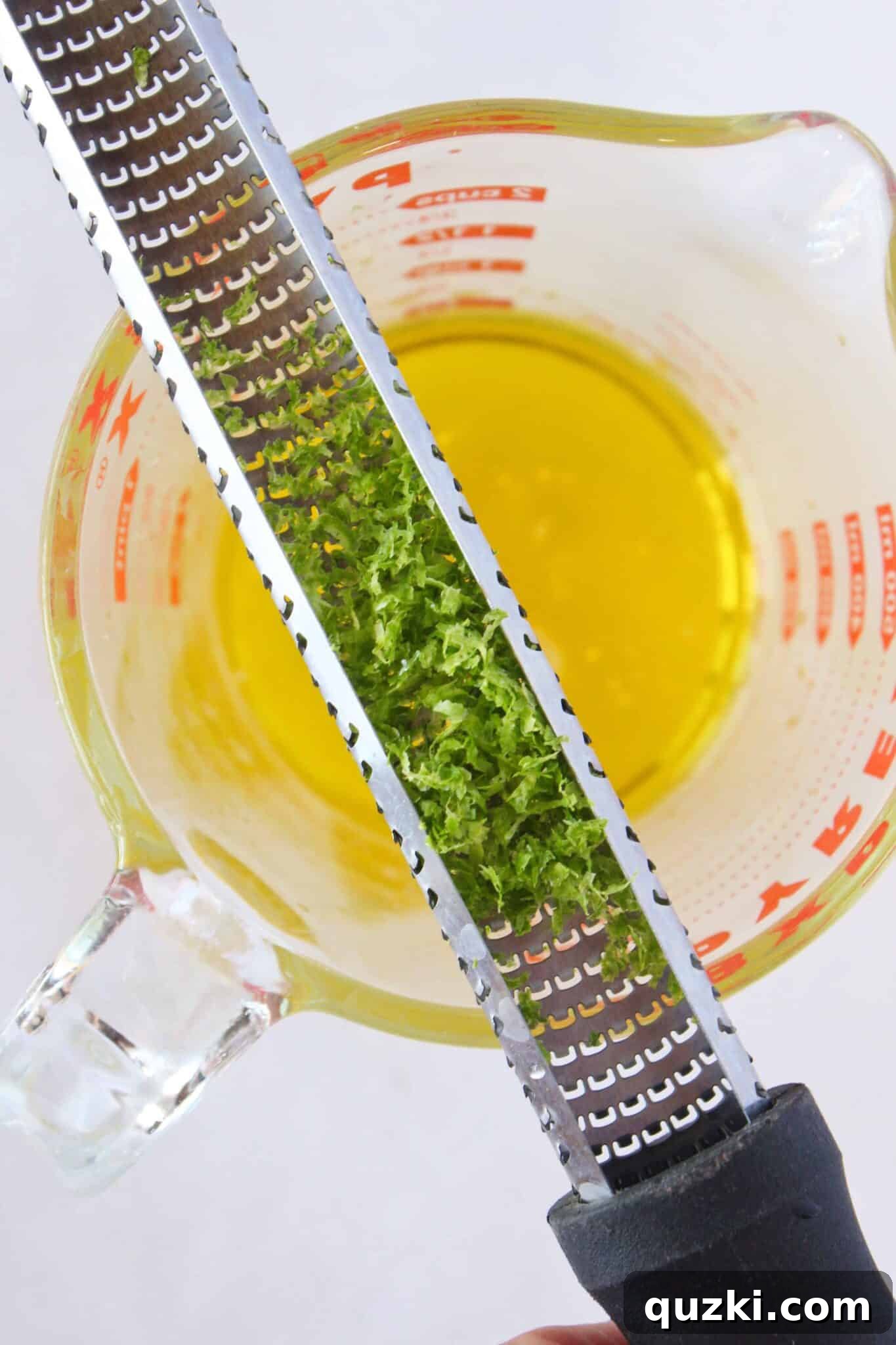 Simple Marinade for Succulent Chicken 4 Adding fragrant lime zest to the vibrant chicken marinade mixture, enhancing its citrus notes.