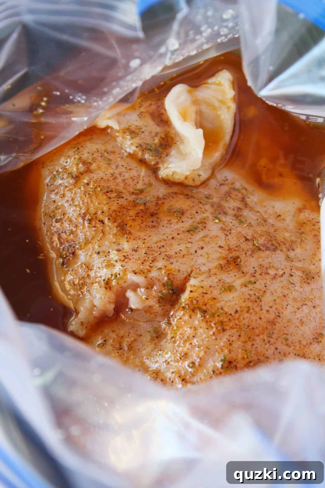 Simple Marinade for Succulent Chicken 6 Chicken and vibrant marinade in a sealed zipper bag, showcasing the ingredients melding together.