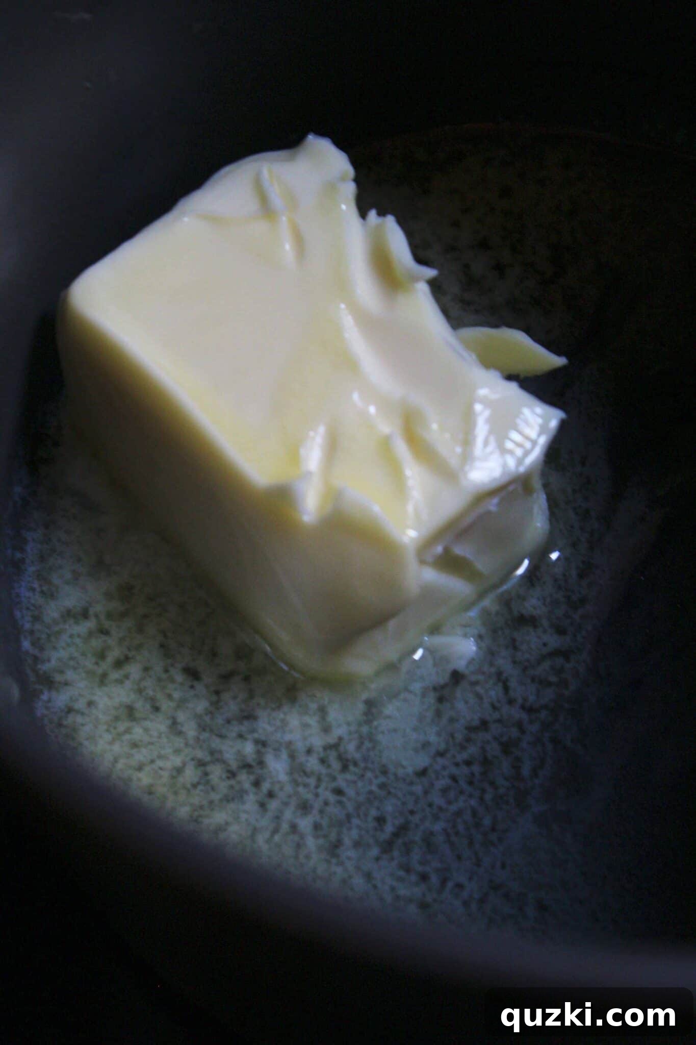 Melting butter for the rich chocolate frosting for Mississippi Mud Cookies