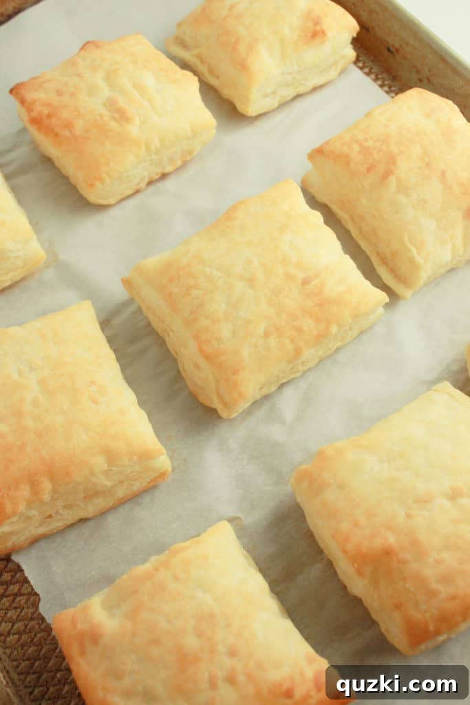 Serving chicken pot pie bowl with puff pastry