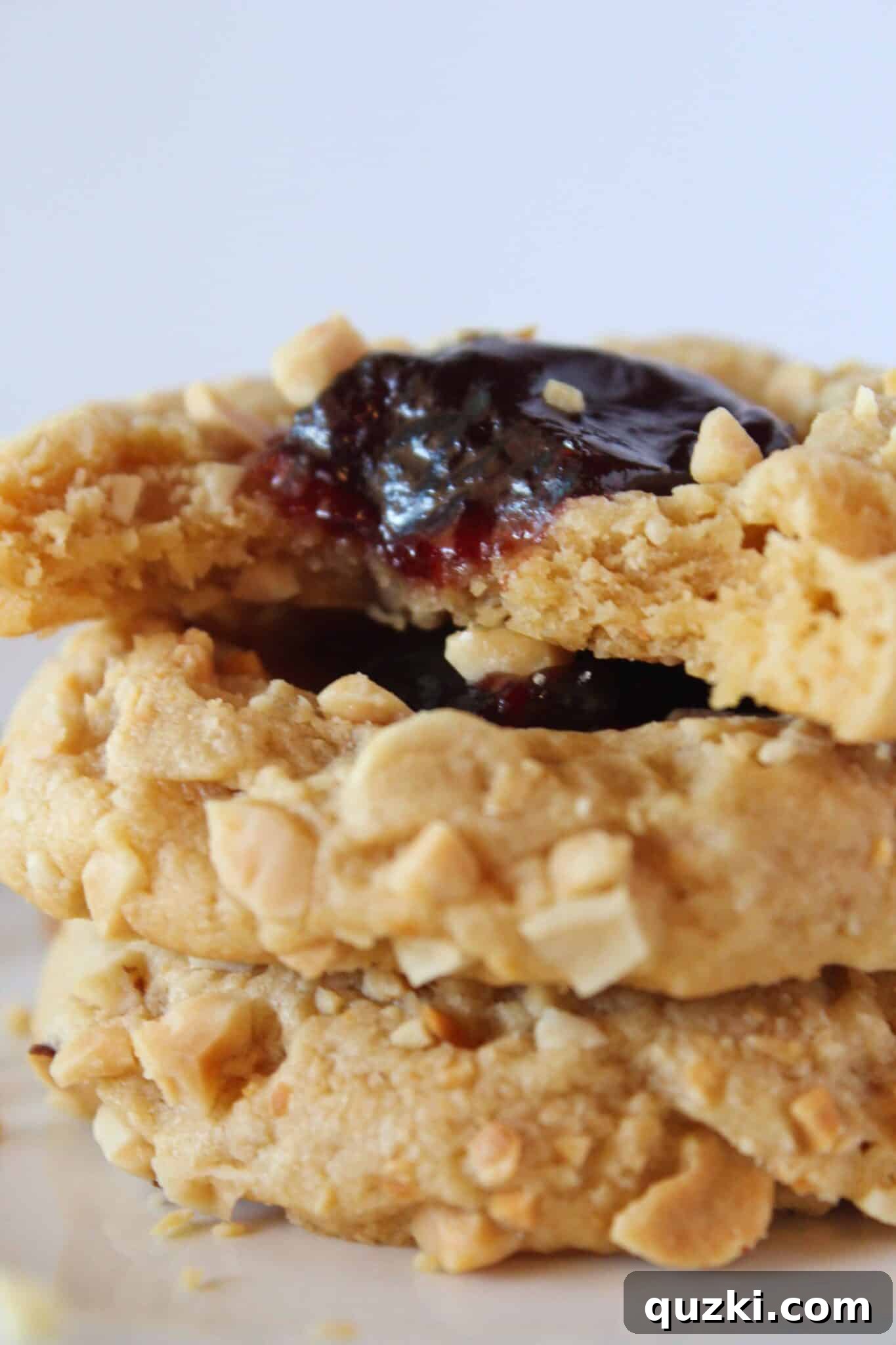 PB&J Cookies stacked neatly on top of each other, ready to be eaten.