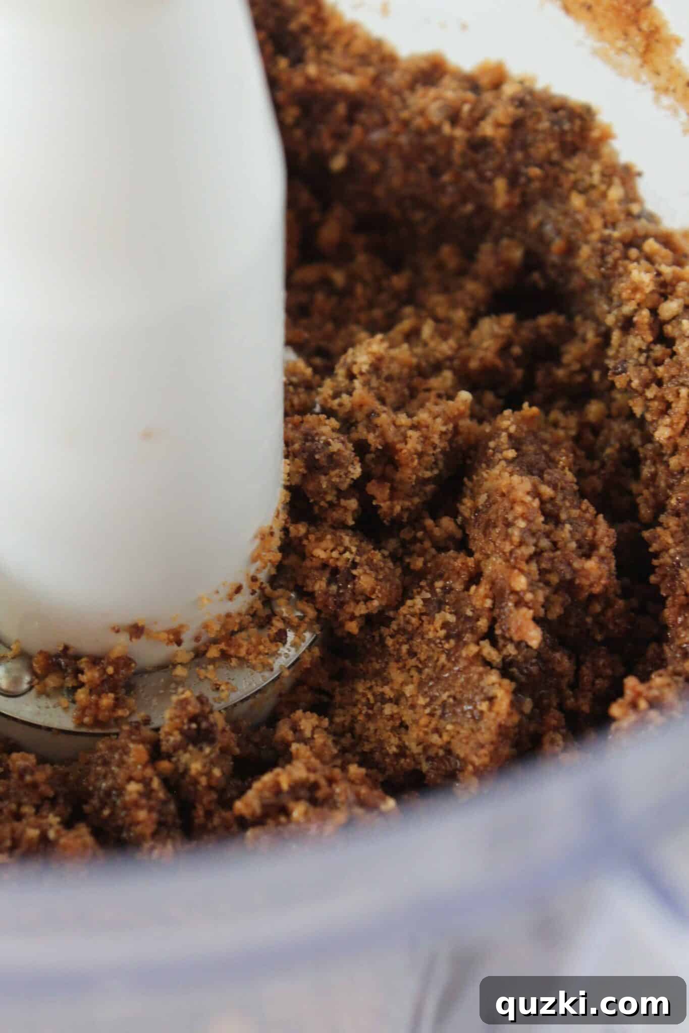Ultimate Chocolate Chip Cookie Cheesecake Crust 6 Chocolate Chip Cookie crumbs thoroughly mixed with melted butter.