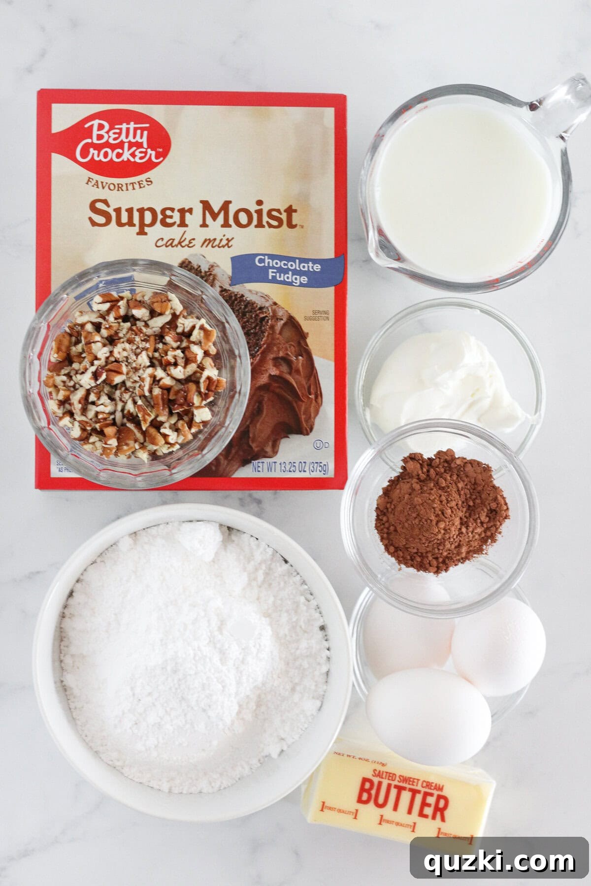 Decadent Texas Sheet Cake Bundt 3 A selection of ingredients laid out, including chocolate cake mix, milk, butter, cocoa powder, and pecans, ready for baking the Texas Sheet Cake.