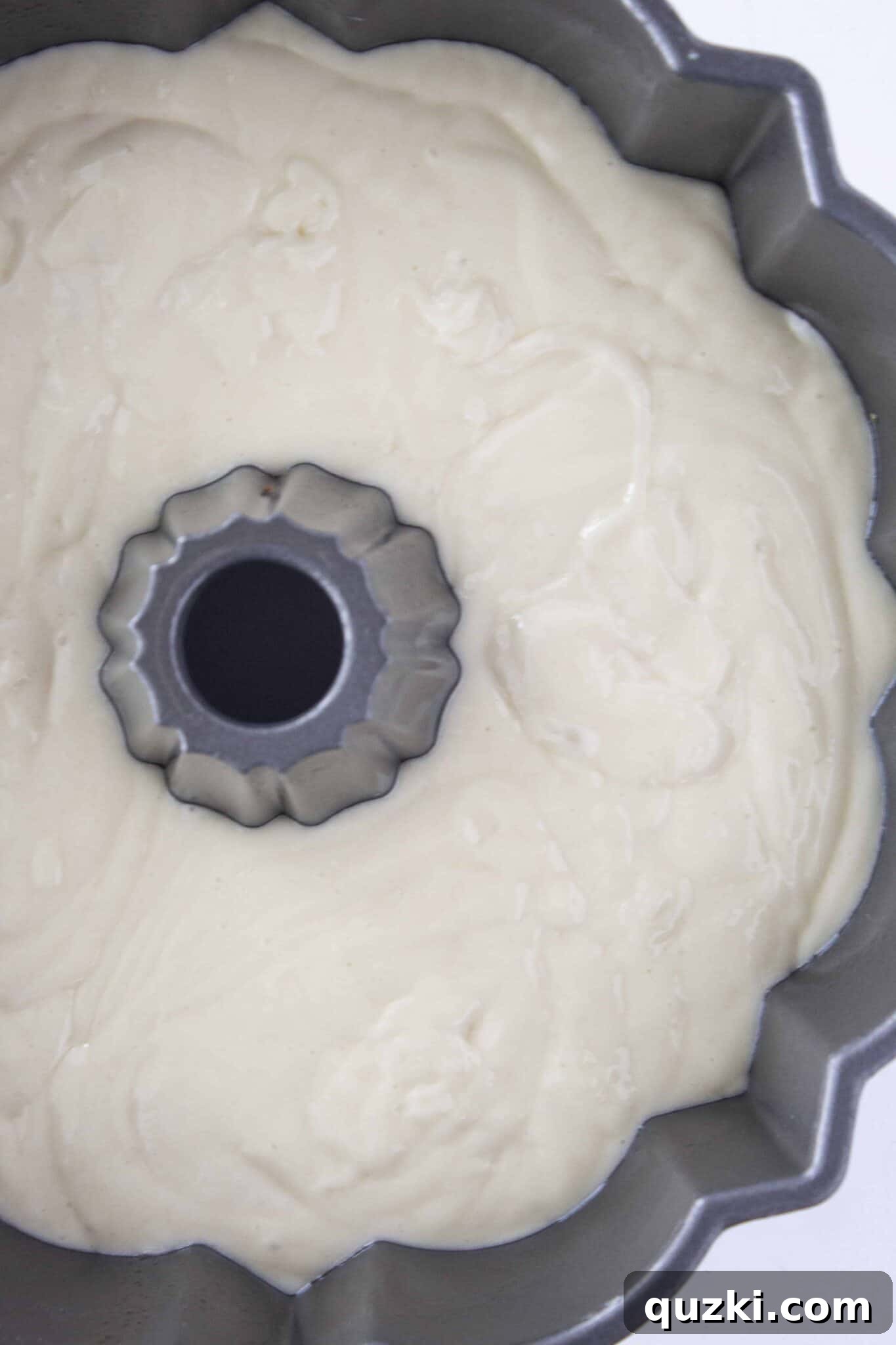 Simple Baklava Bundt Cake with a Cake Mix Shortcut 6 Baked Baklava Bundt Cake still in the pan, cooling on a rack