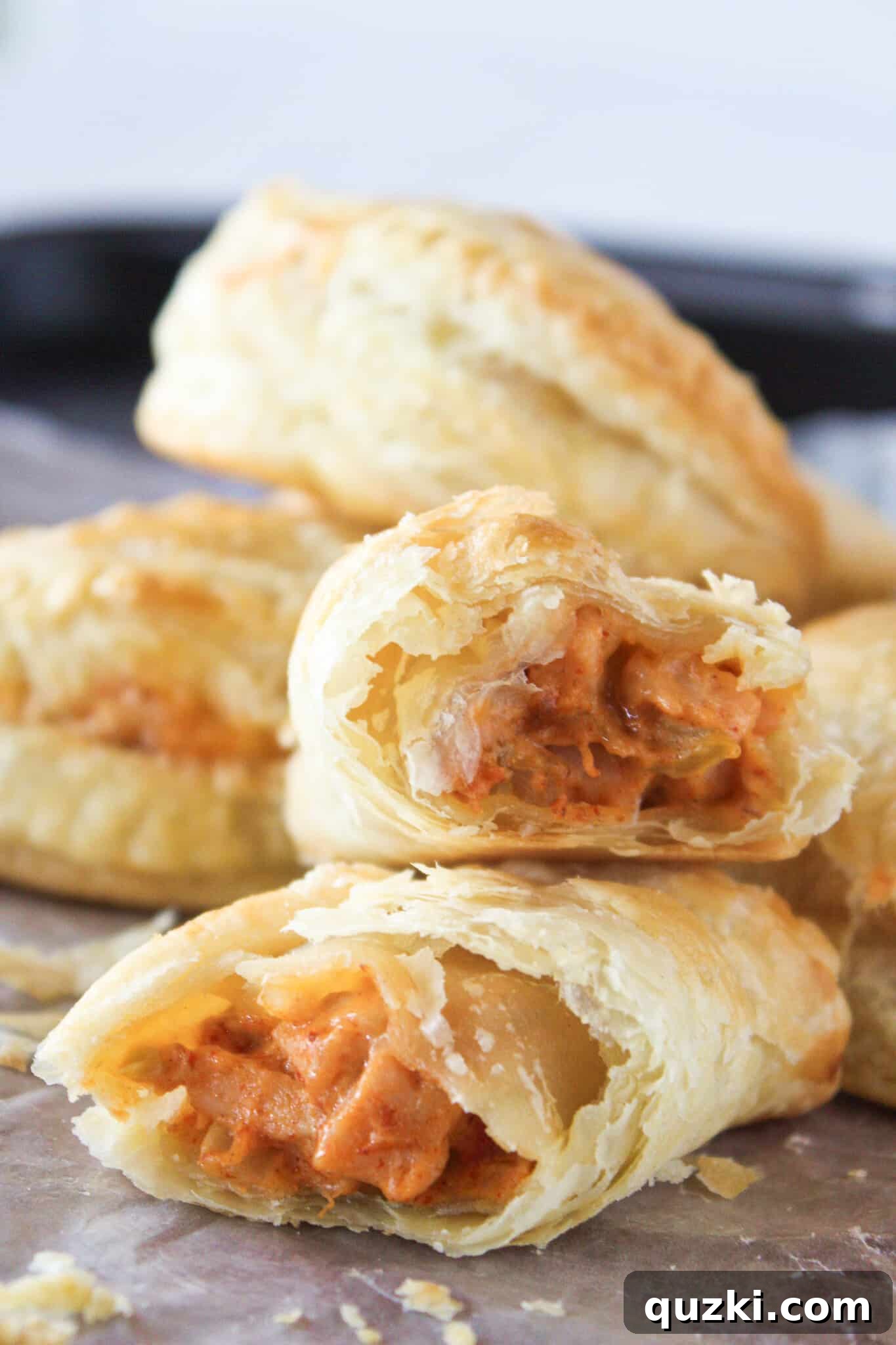 Delicious golden brown leftover Turkey Empanadas, perfectly baked and ready to serve.