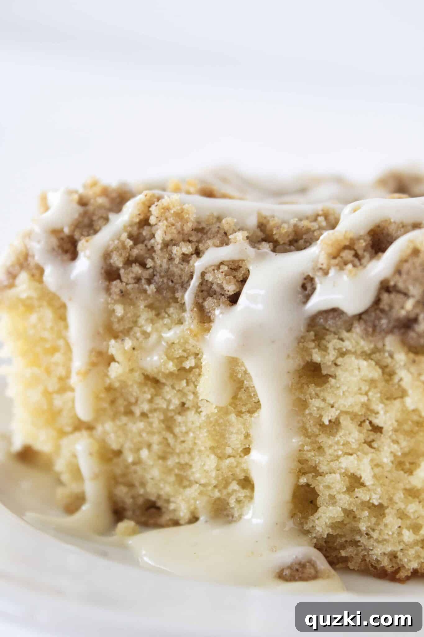 Sweeten Your Christmas Morning: Eggnog Coffee Cake 2 Moist Eggnog Coffee Cake with a generous crumb topping, ready for a festive breakfast. A top US food blogger's holiday recipe.