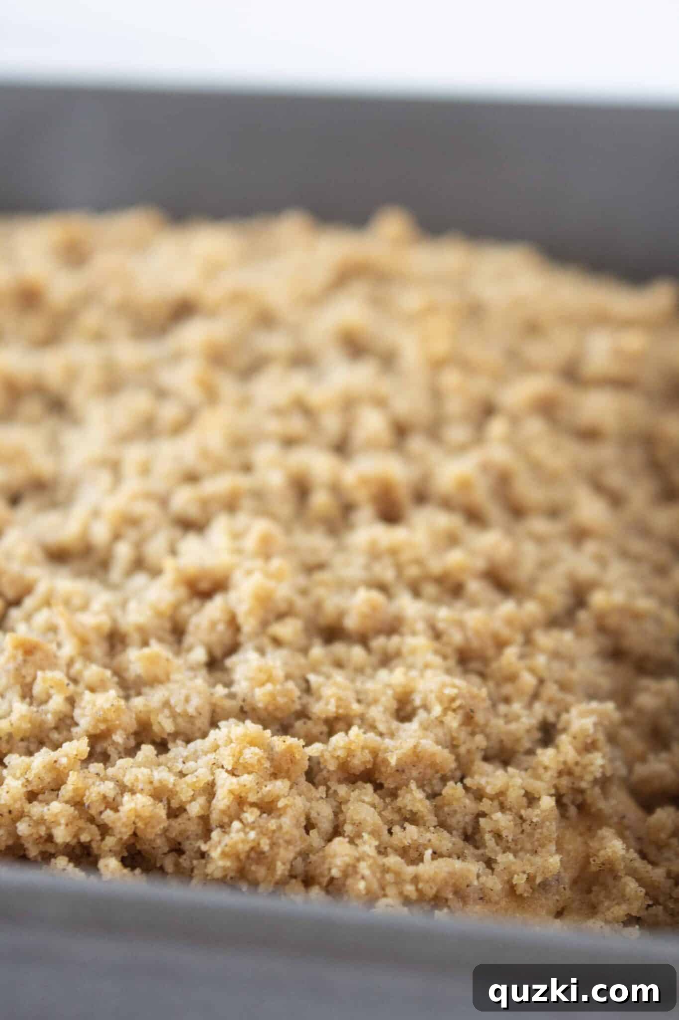 Sweeten Your Christmas Morning: Eggnog Coffee Cake 8 Finished Eggnog Coffee Cake drizzled with eggnog glaze, ready to be served.