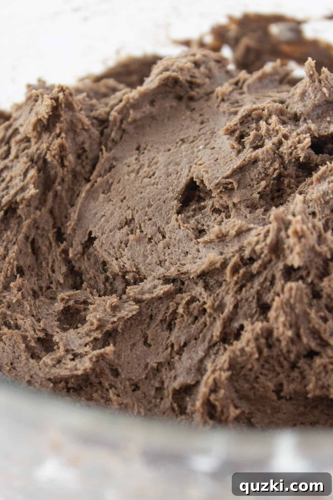 Effortless Cake Mix Cream Cheese Chocolate Cookies 5 Step-by-step: Mixing chocolate cake mix into the creamed butter and egg mixture to form cookie dough