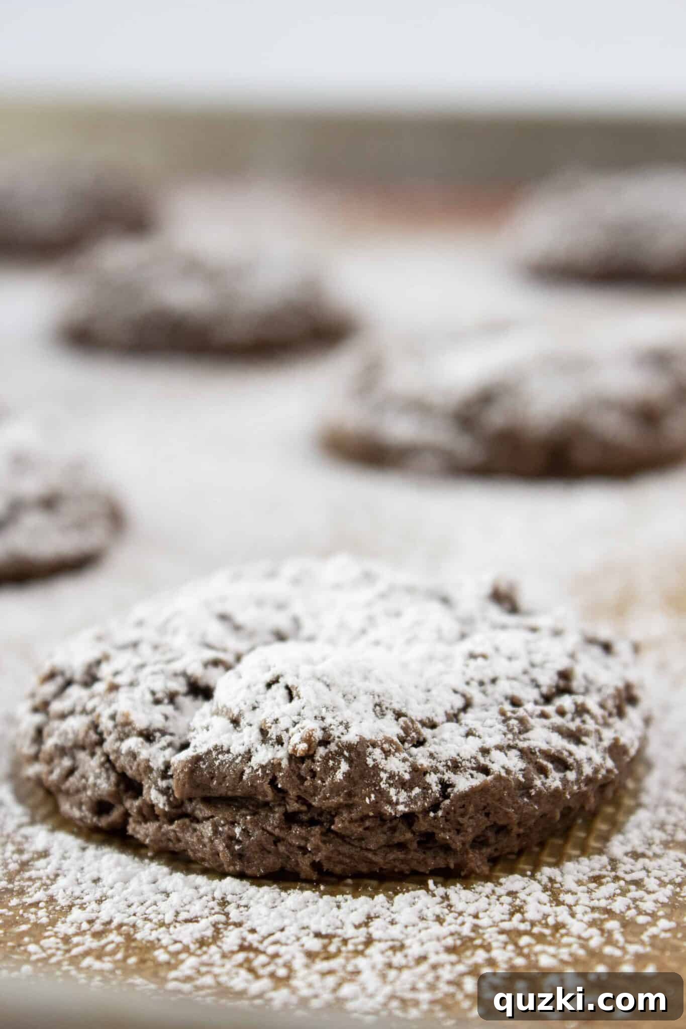 Effortless Cake Mix Cream Cheese Chocolate Cookies 8 Chocolate Cream Cheese Cake Mix Cookies dusted with powdered sugar, ready to be enjoyed