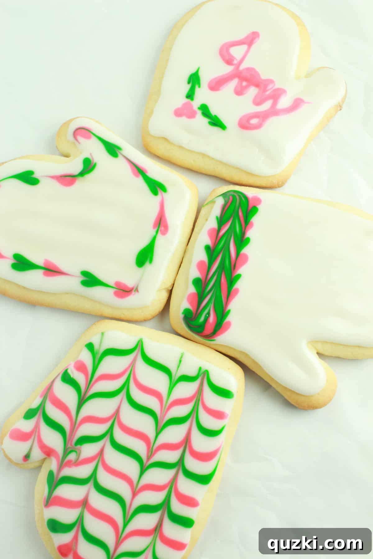 Sugar cookies decorated with beautiful Glacé icing, showing intricate yet easy designs