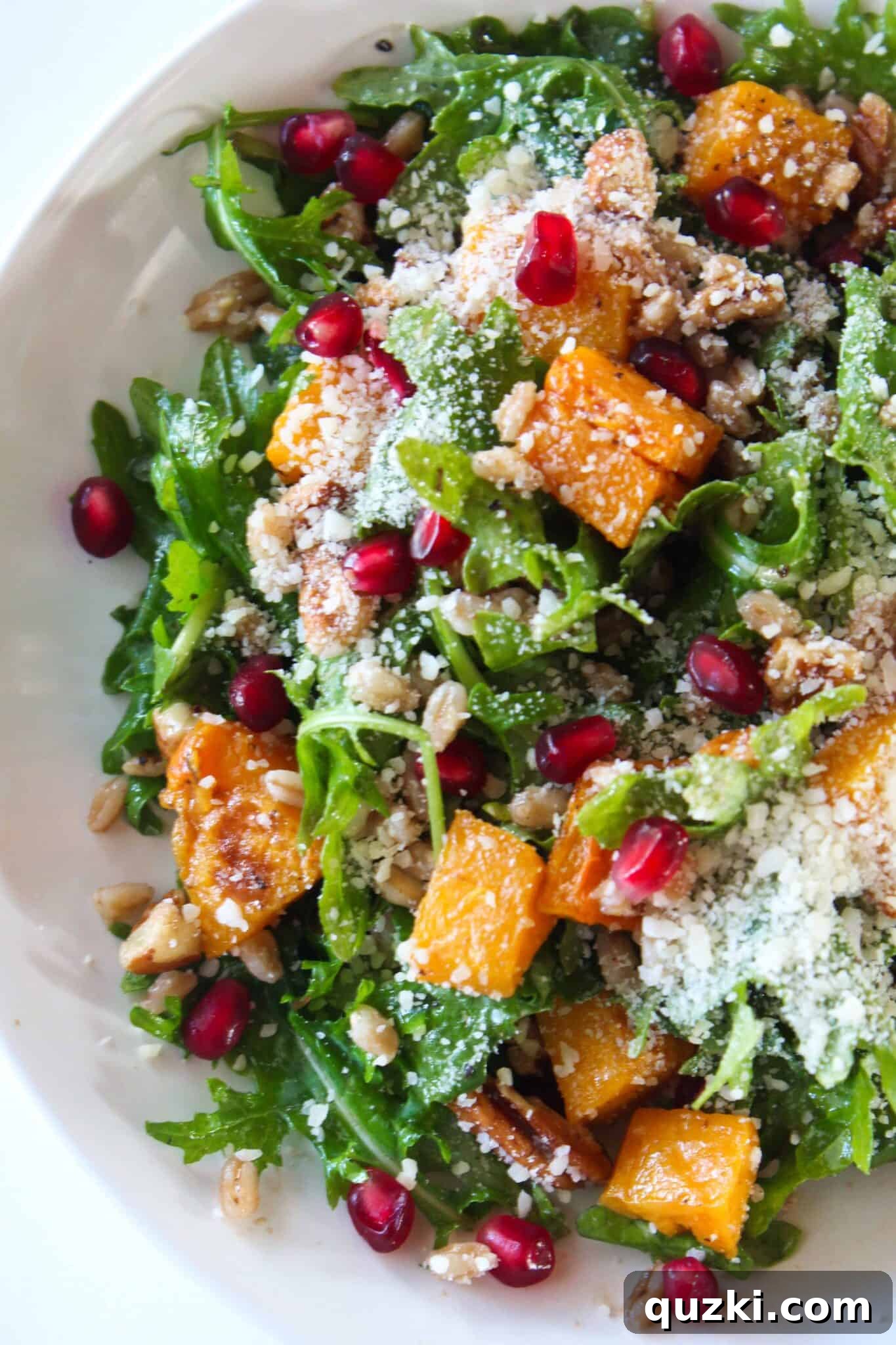 Cozy Winter Salad Recipe featuring butternut squash, pomegranate, and farro, ideal for a comforting winter meal.