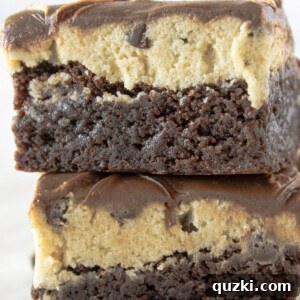 A delicious stack of three-layer cookie dough brownies.