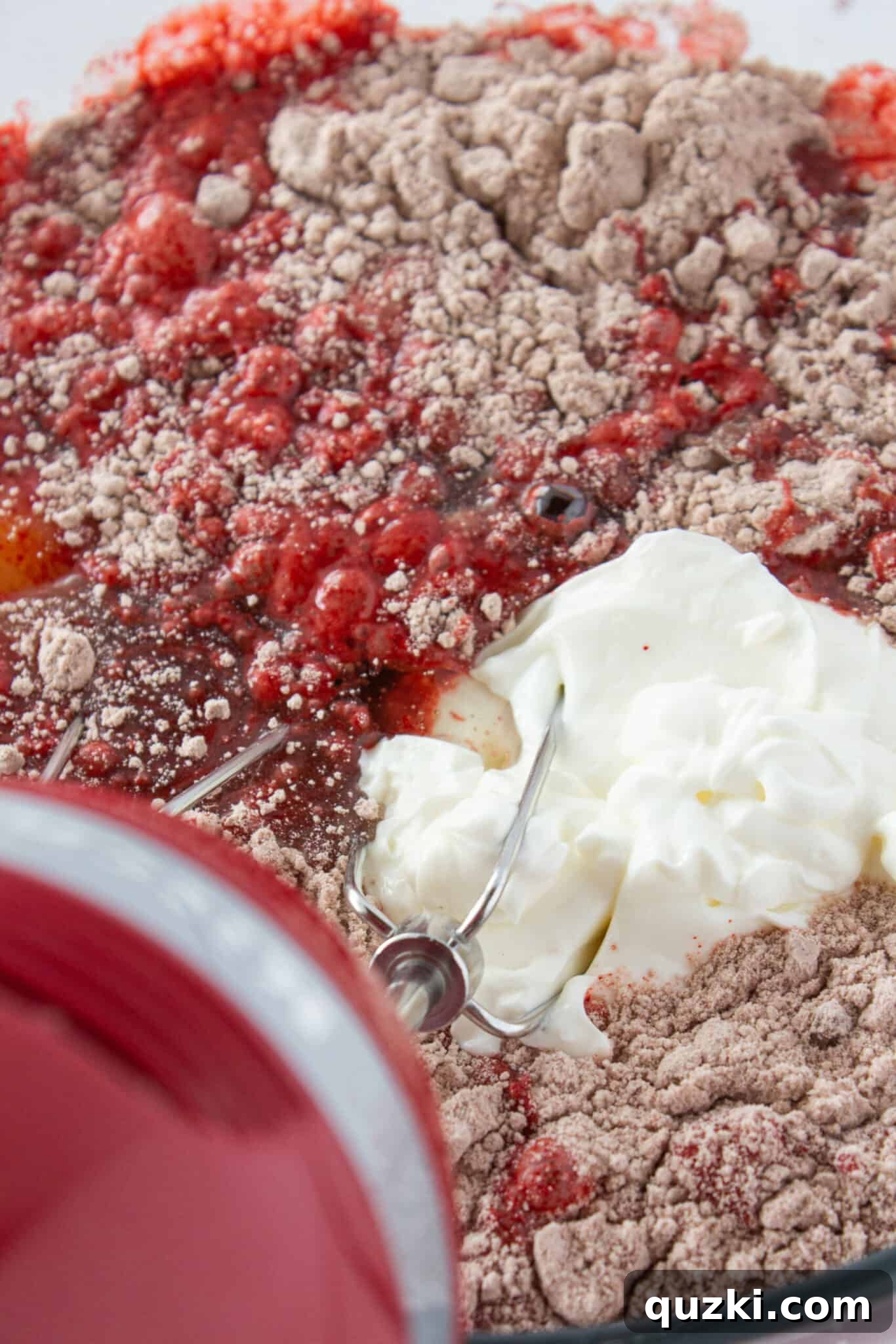 Black Bottom Red Velvet Bundt Cake Made Easy 4 Preparing the vibrant red velvet cake batter from a mix.