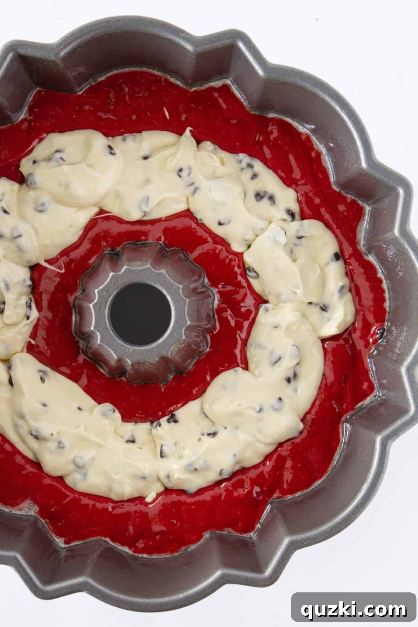 Black Bottom Red Velvet Bundt Cake Made Easy 7 Adding the cheesecake filling in a ring over the red velvet batter in the pan.