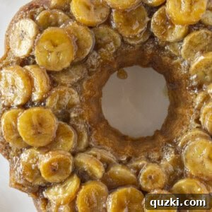A beautifully baked Banana Upside Down Cake, fresh from the oven, before being sliced.