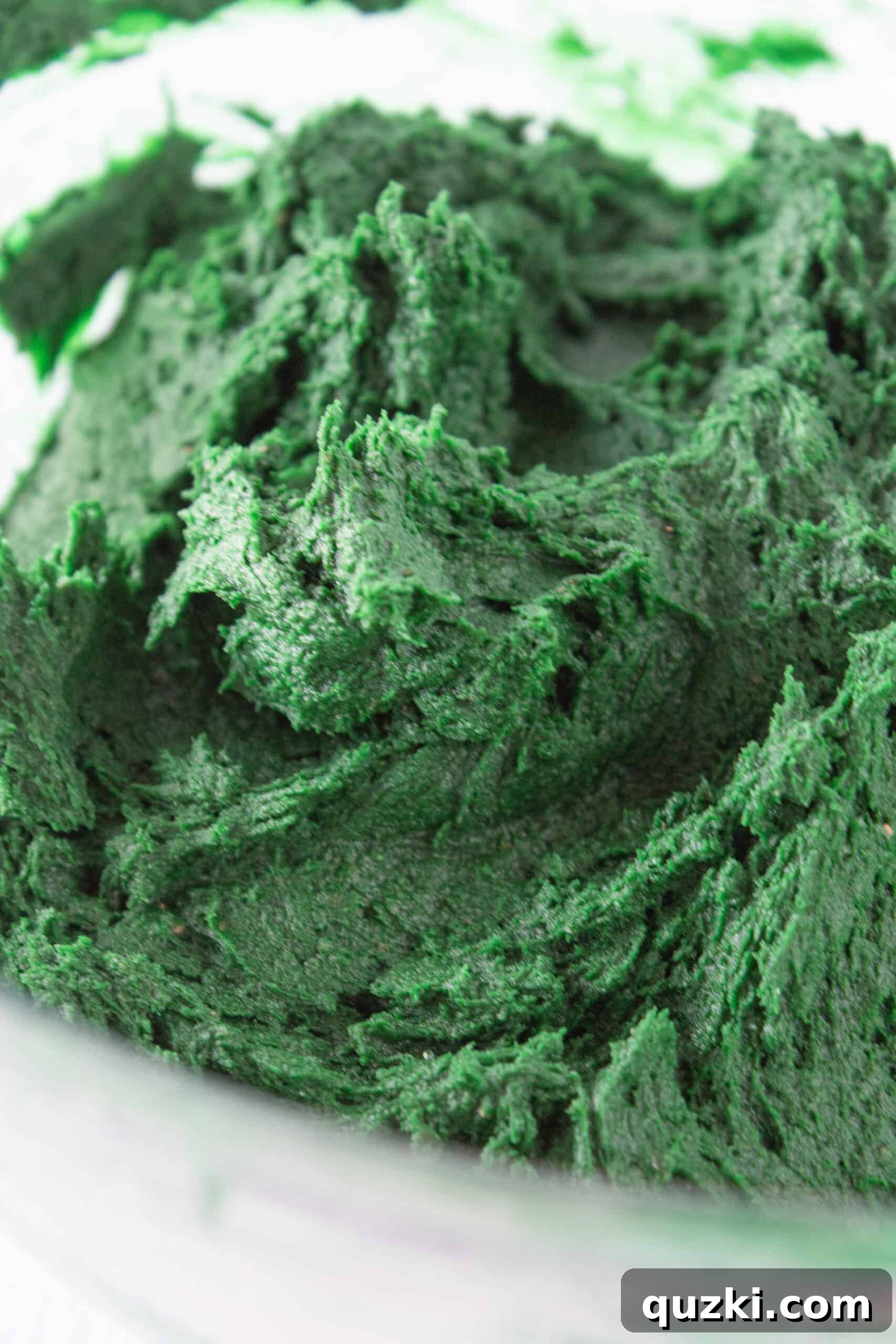 Effortless Green Velvet Cake Mix Cookies 5 Thick, vibrant green cake mix cookie dough ready for baking.