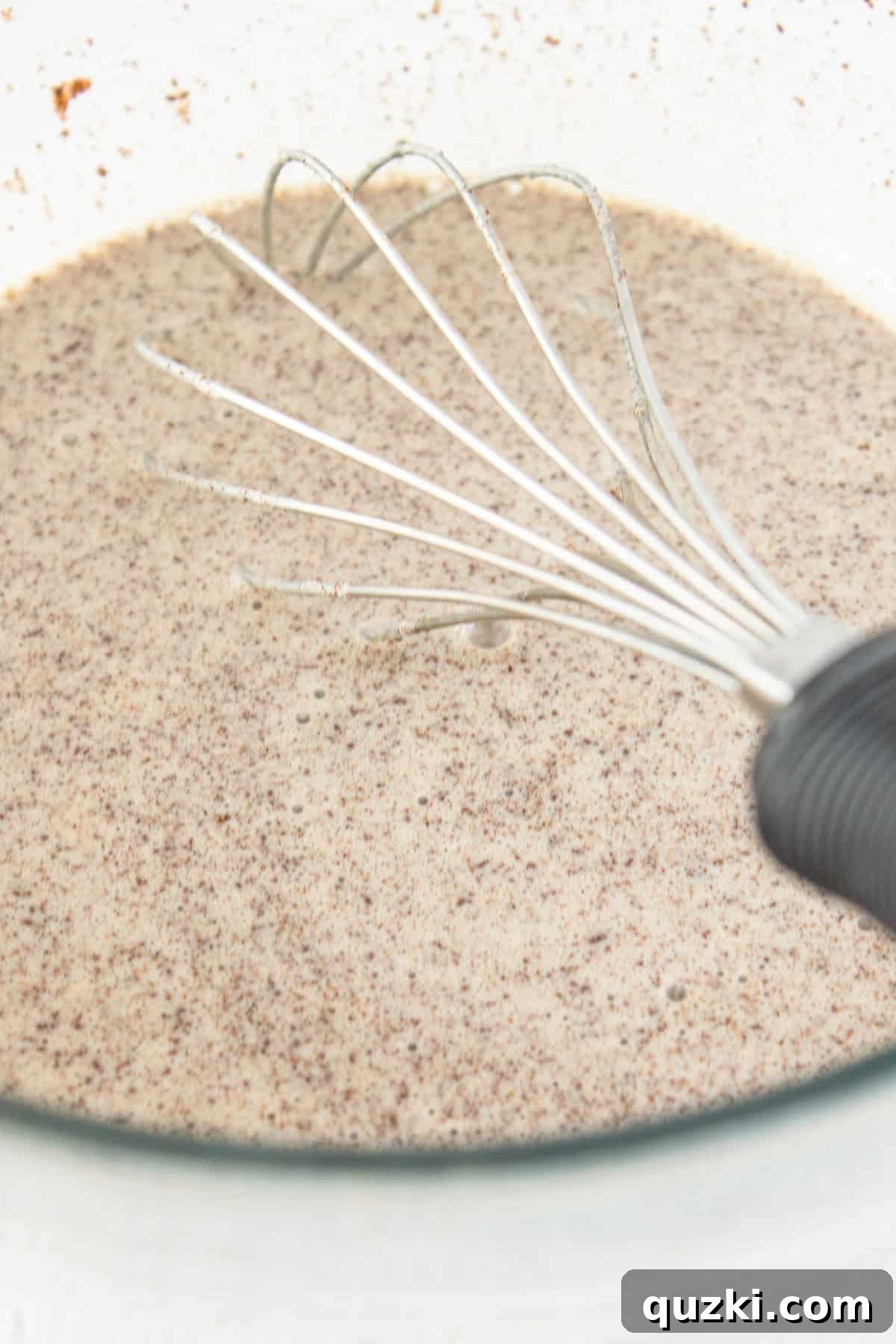 Whisking the french toast batter until everything is combined.