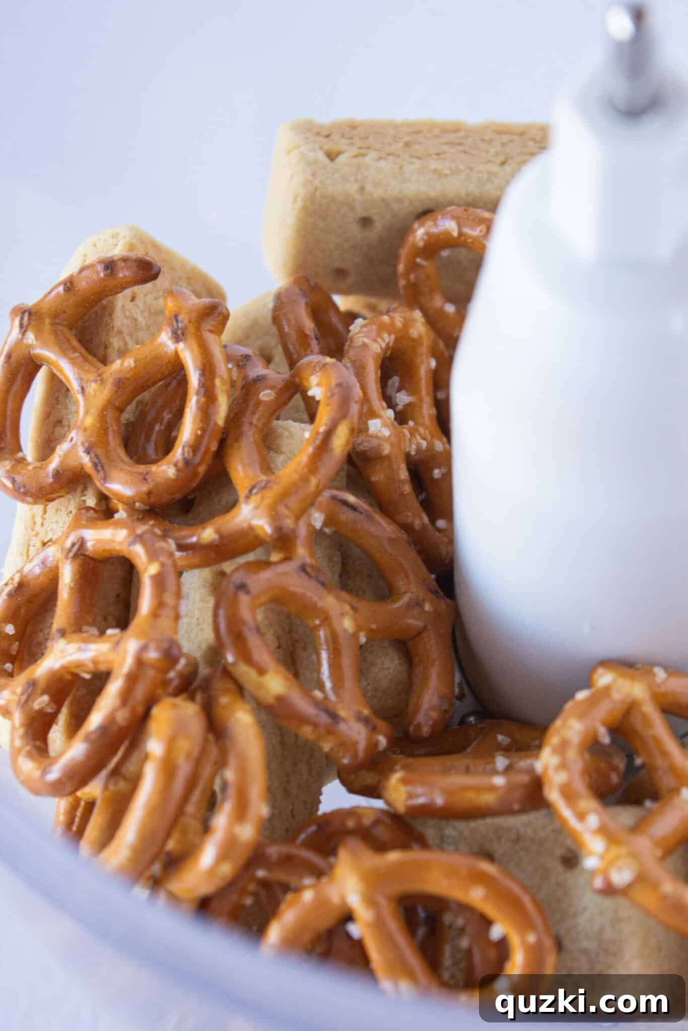 Crushing shortbread cookies and pretzels for the No Bake Millionaire Bars crust