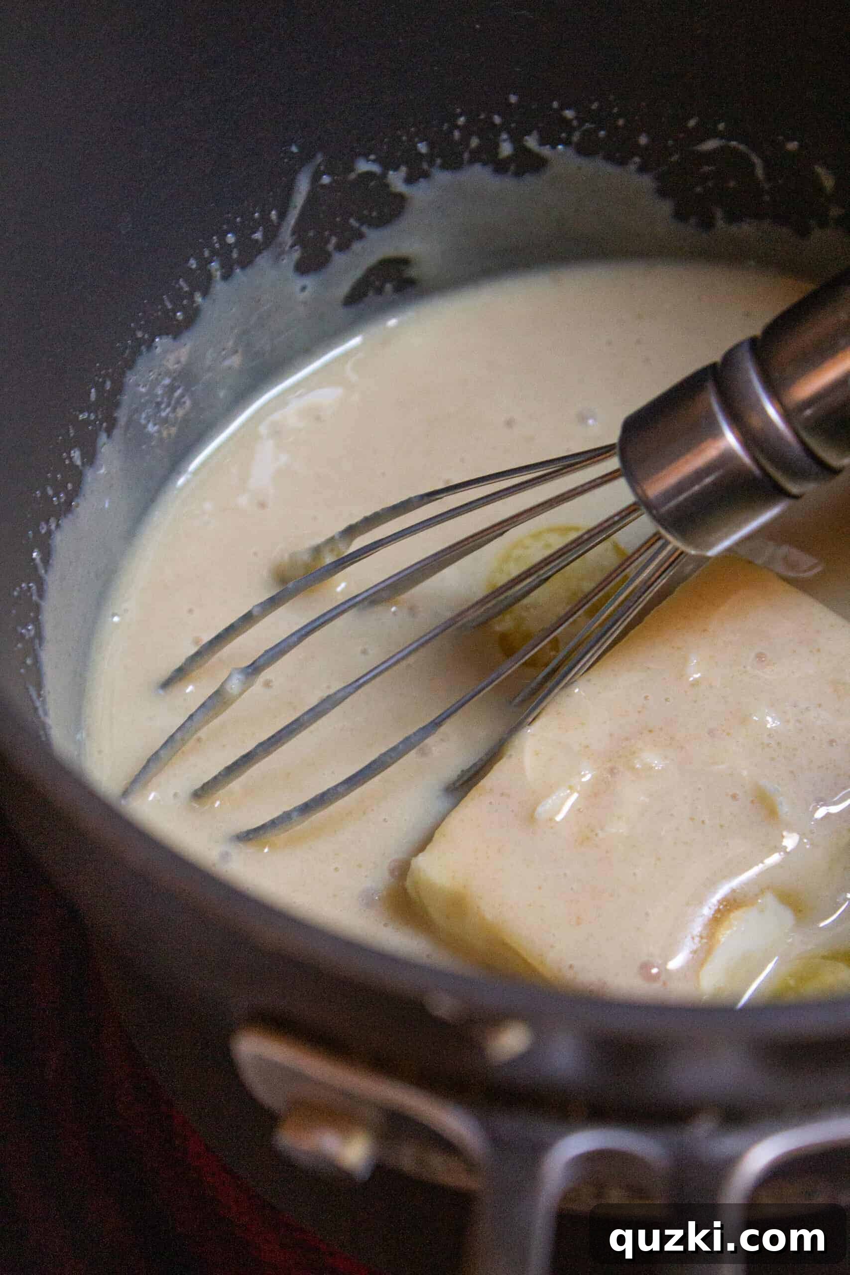 Ingredients for the caramel layer in a saucepan: brown sugar, butter, and sweetened condensed milk