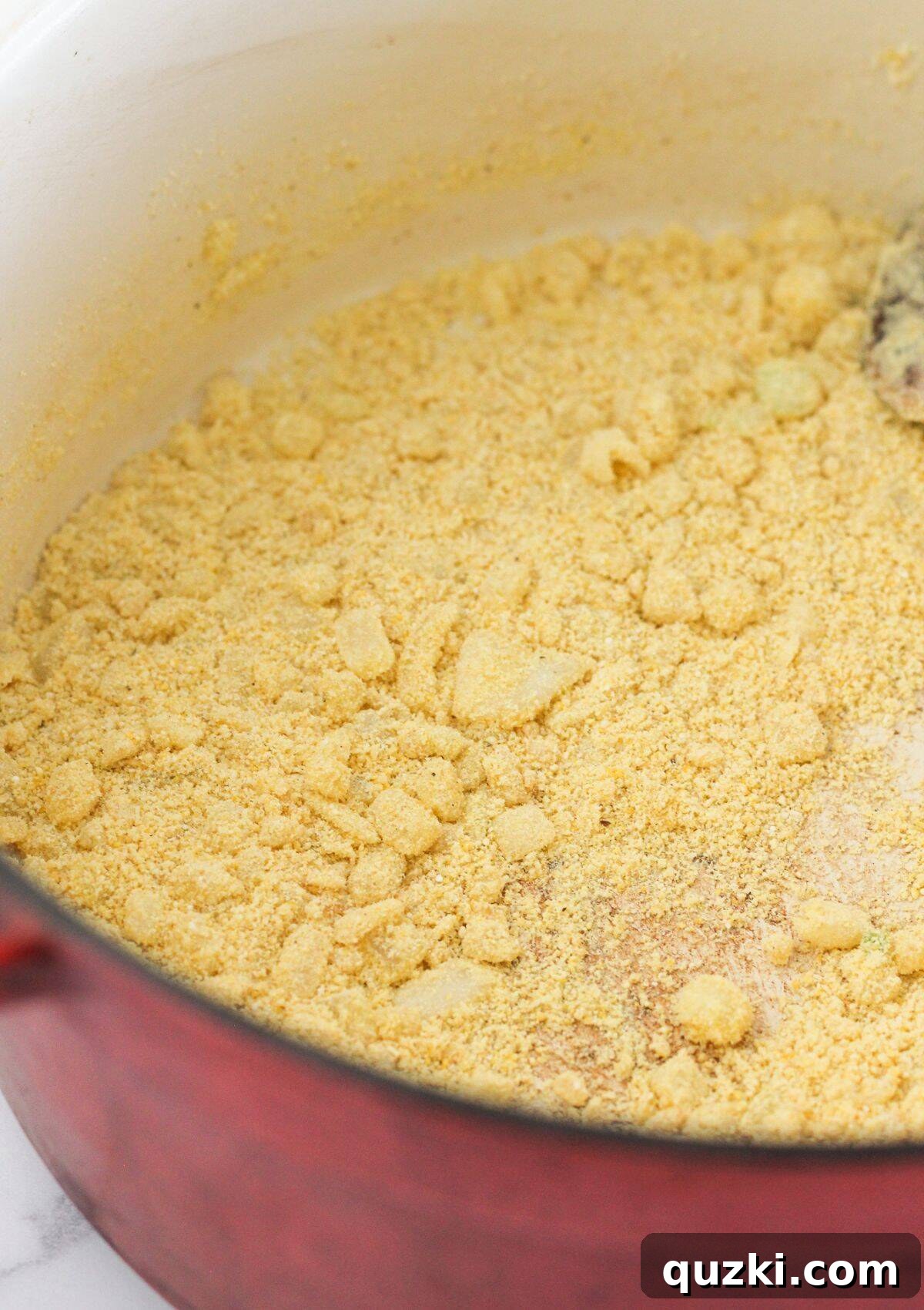 Effortless 20 Minute Chicken Enchilada Soup 4 Chopped onions and masa flour simmering in a pot with olive oil.